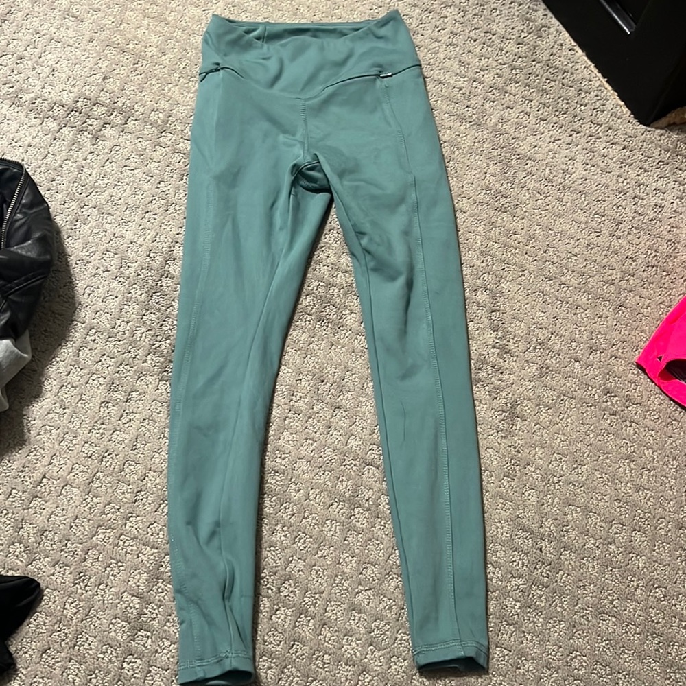 Green leggings
